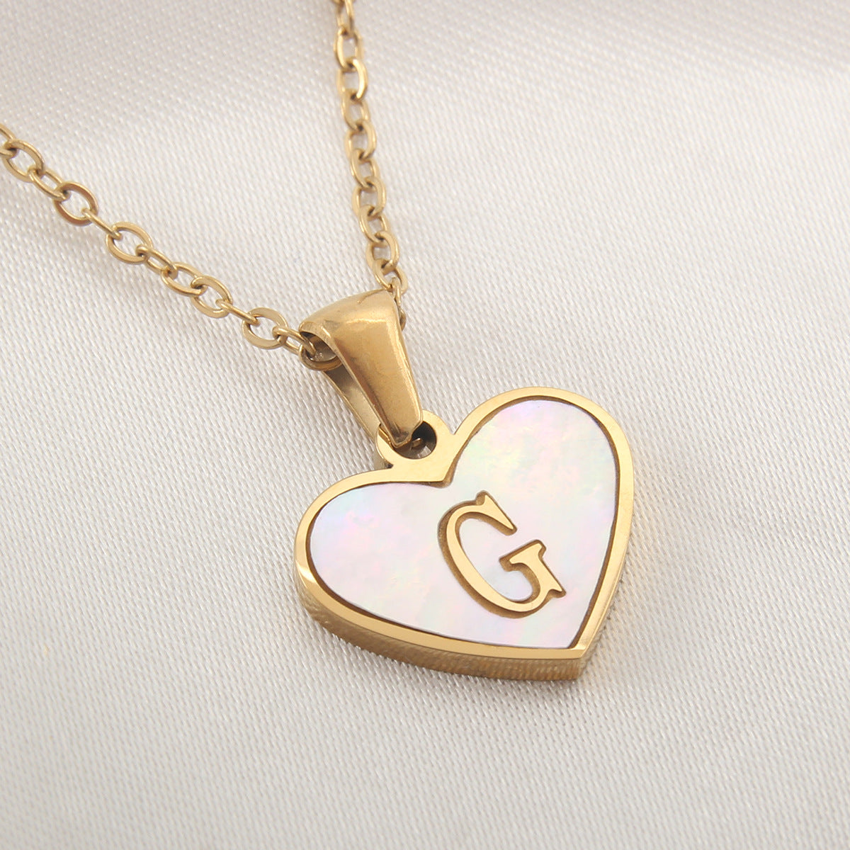 gold heart shaped locket