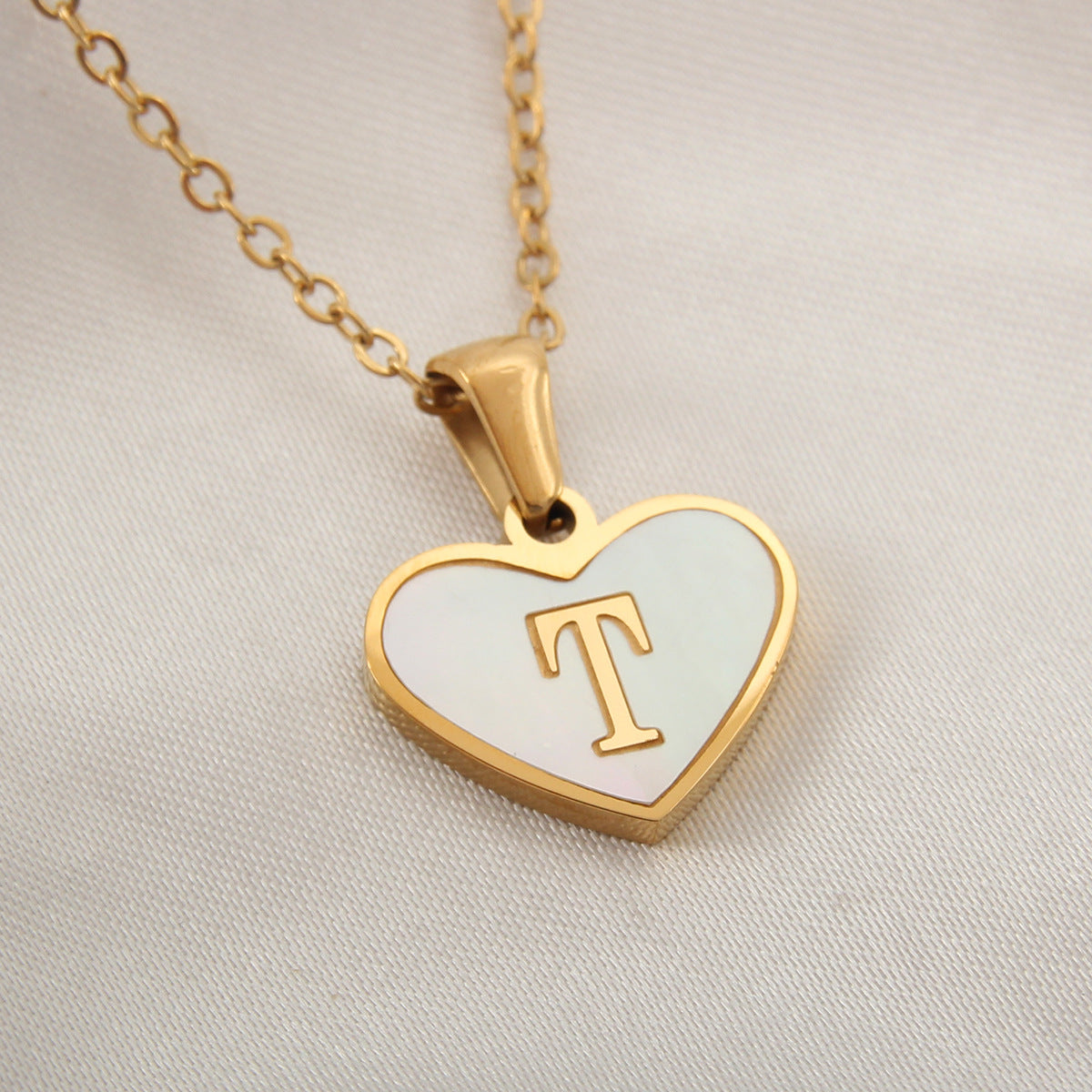 gold heart shaped locket