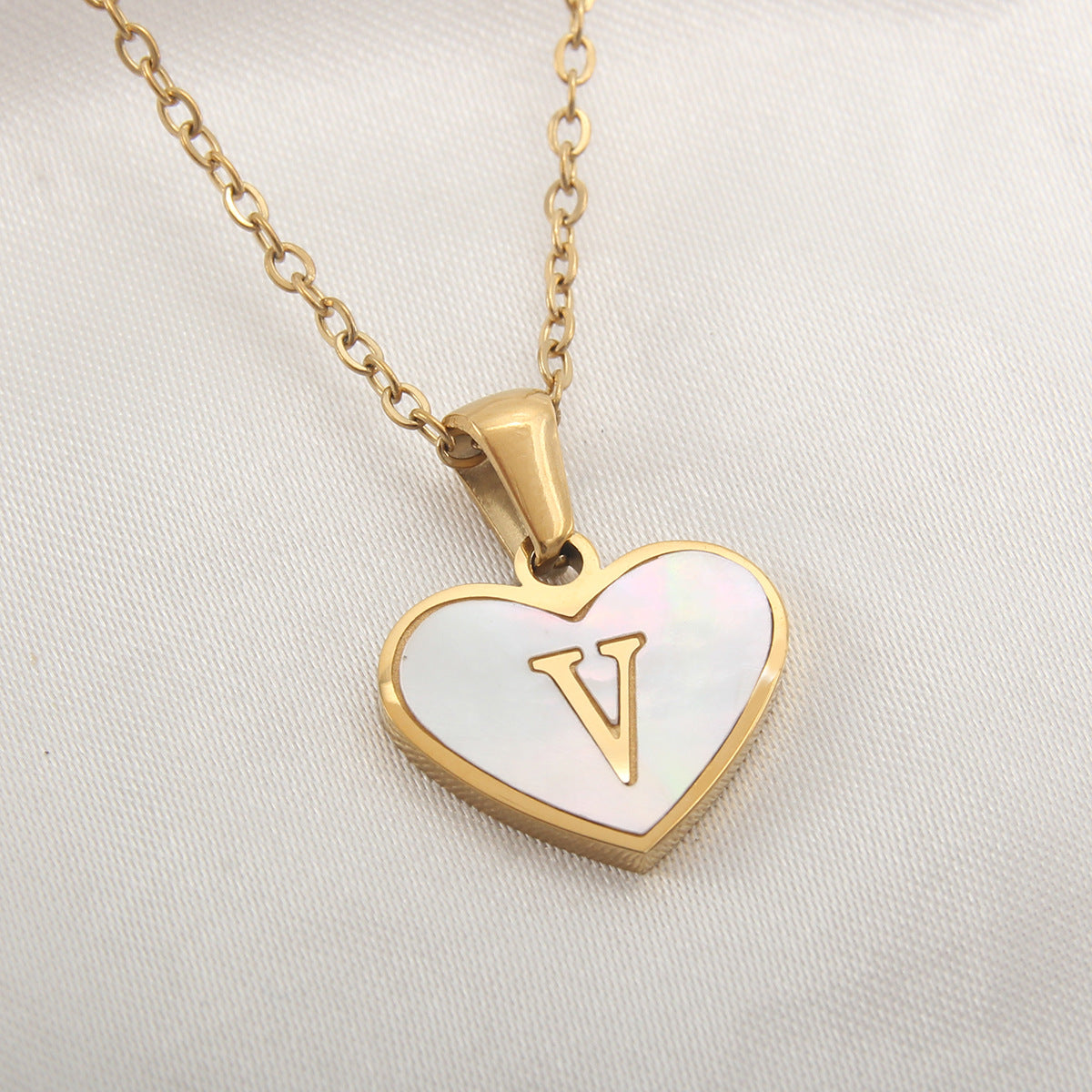 gold heart shaped locket