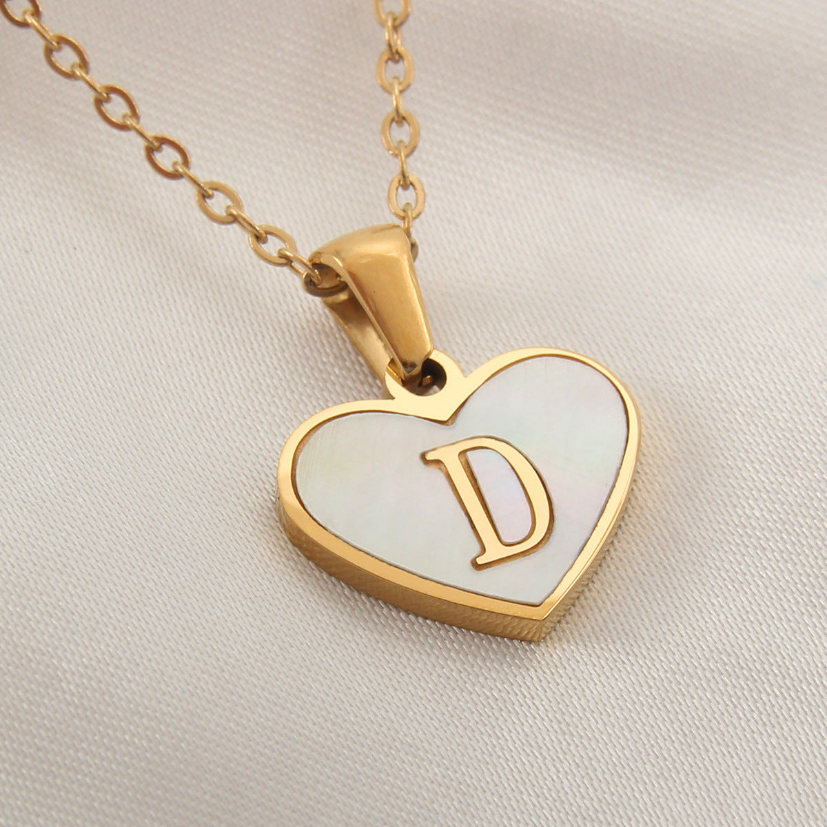 gold heart shaped locket