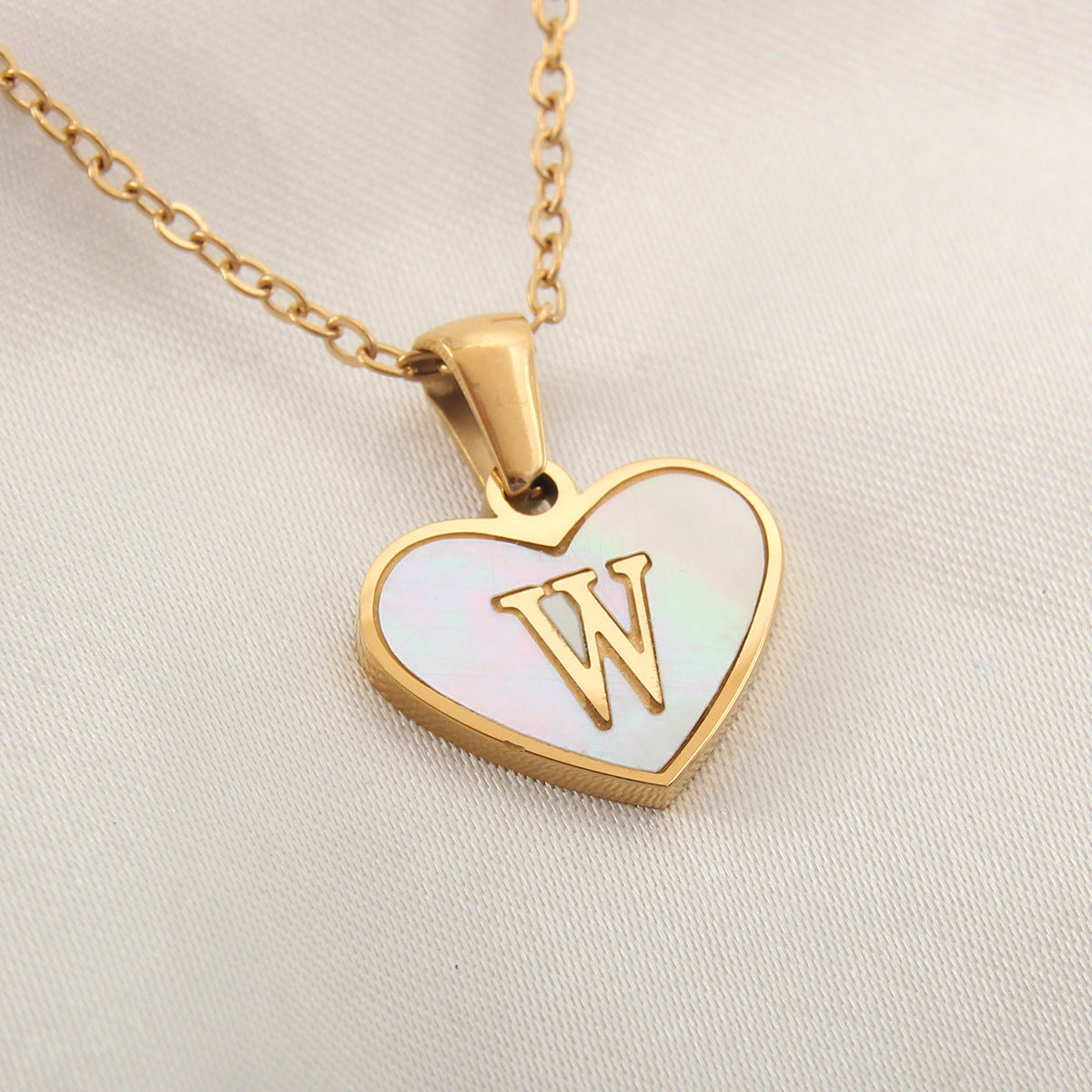 gold heart shaped locket