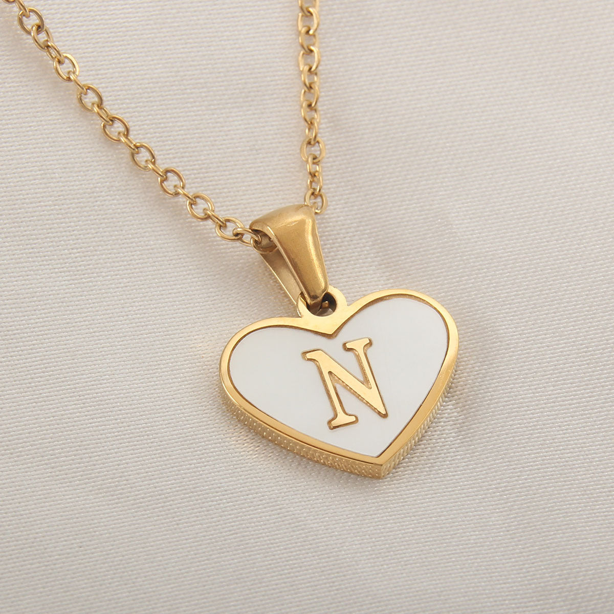 gold heart shaped locket