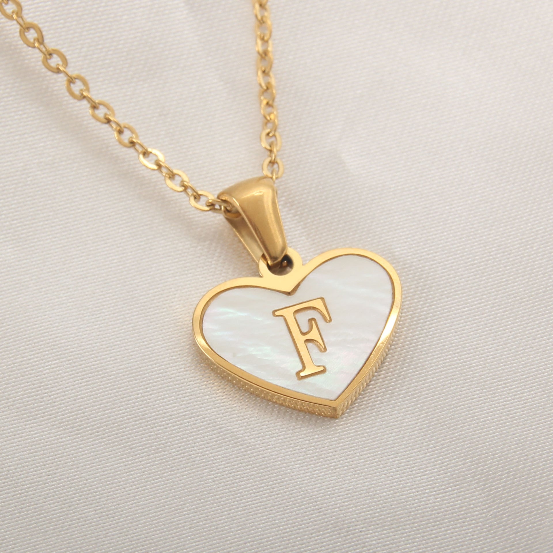 gold heart shaped locket