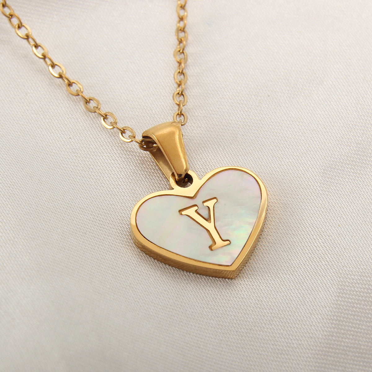 gold heart shaped locket