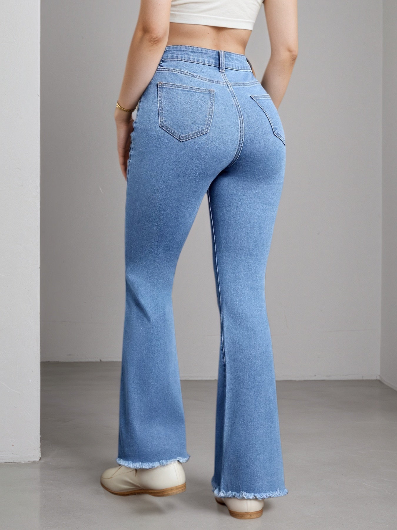 Distressed bell bottom jeans